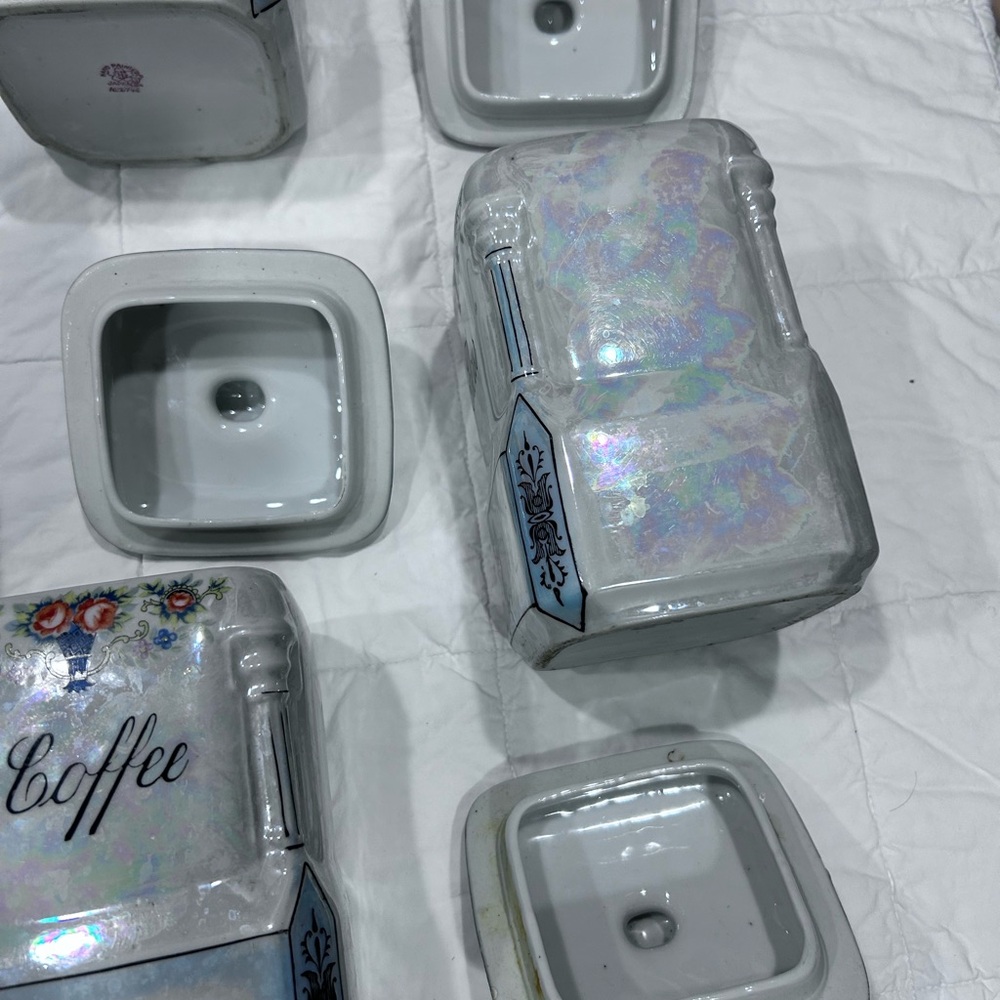 Antique canisters with various hues of blues aurora borealis, inherited